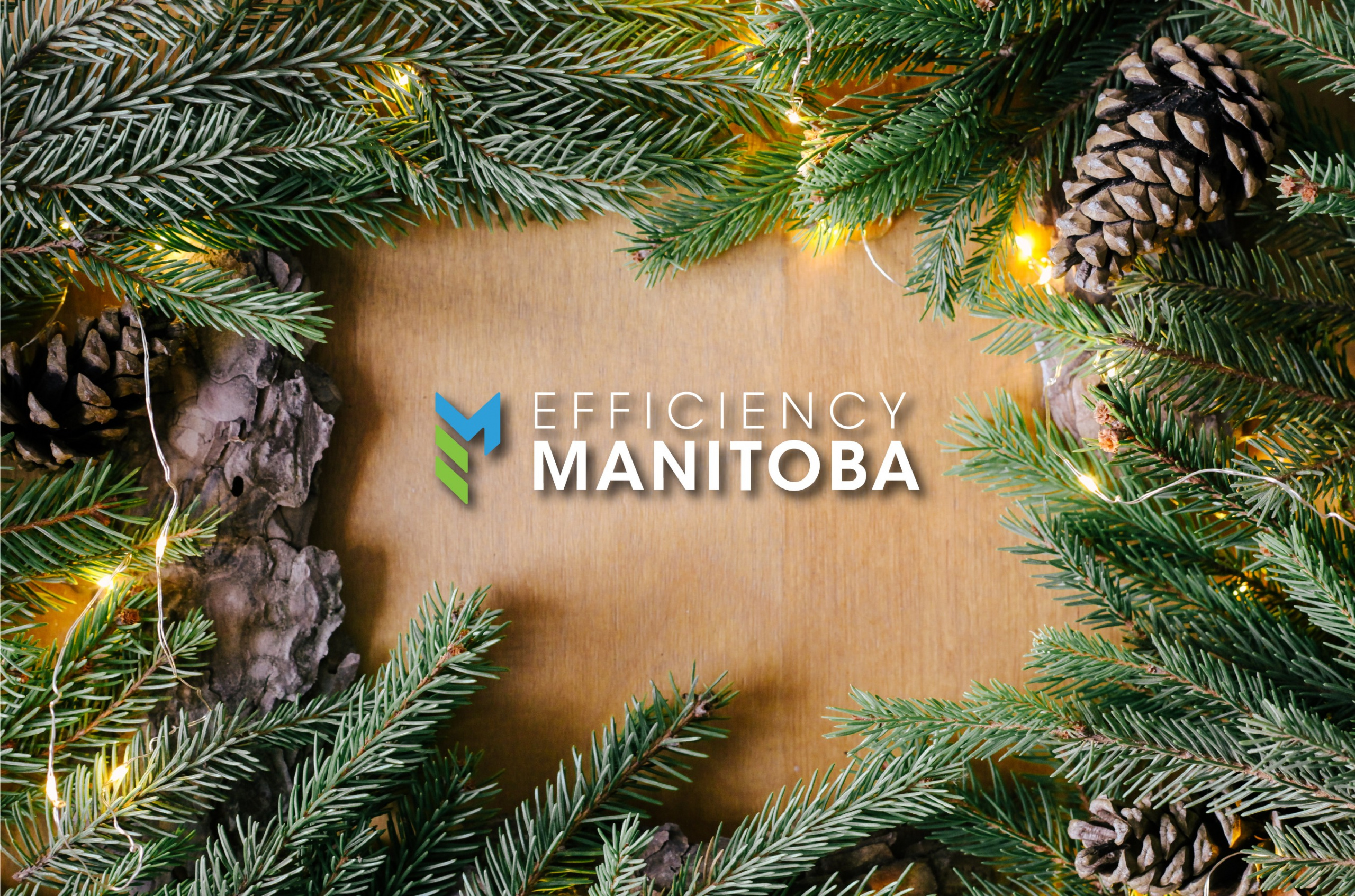 Efficiency Manitoba logo within a wreath