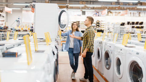 Couple shopping for dryers