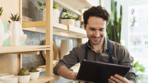 Florist using tablet at work