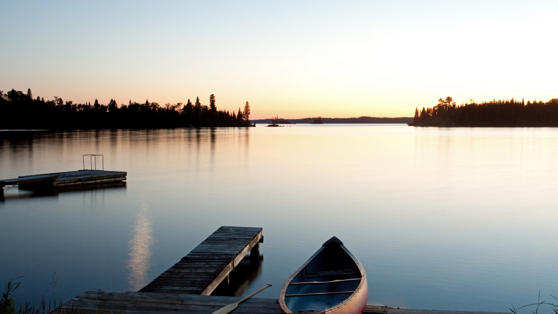 Canoe on a dock at dusk