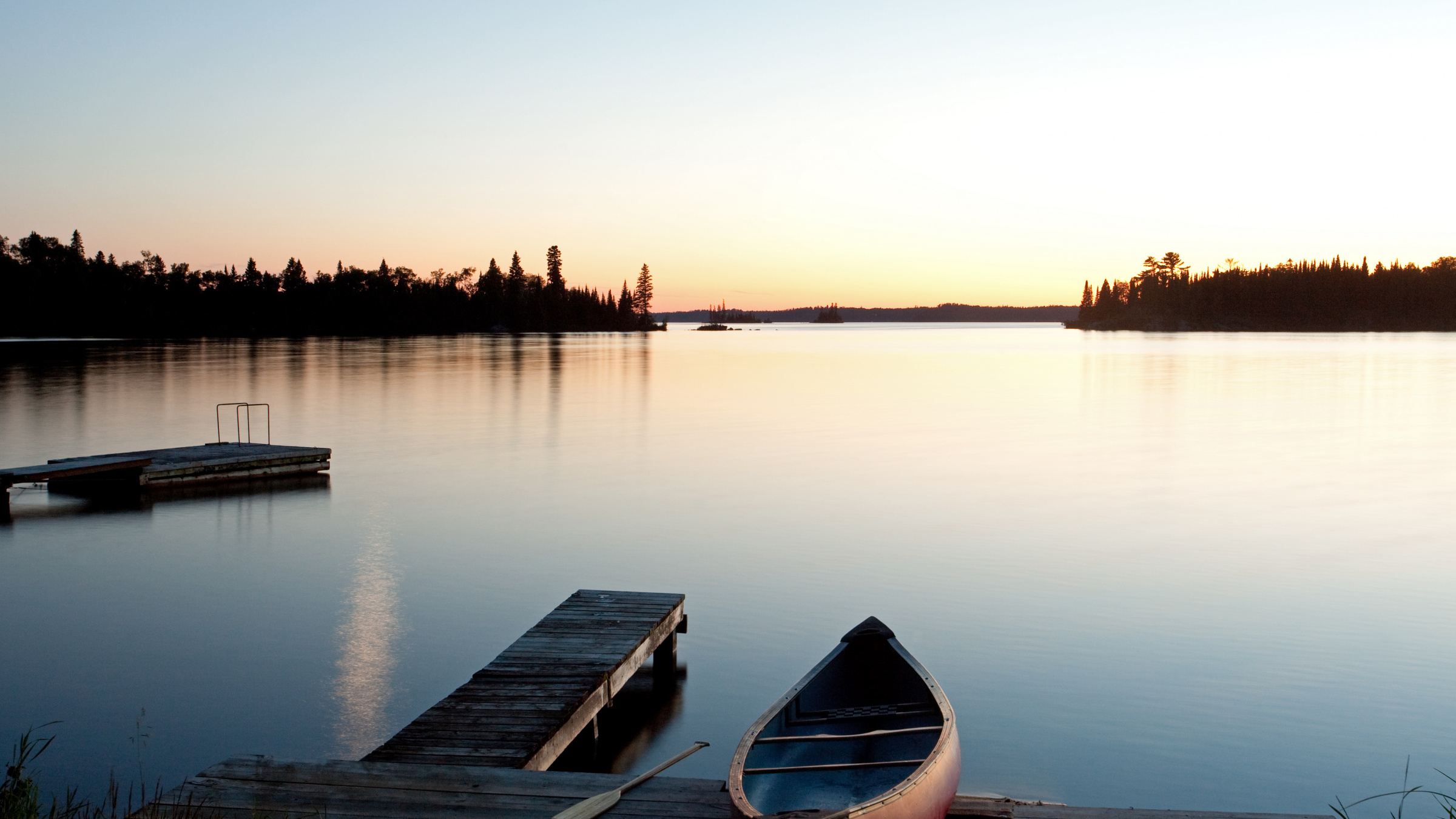 Canoe on a dock at dusk