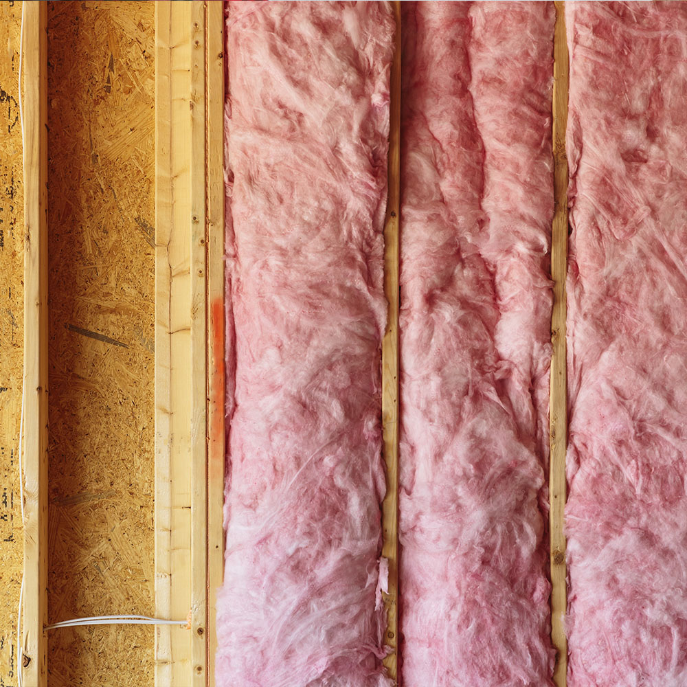 Fiberglass insulation in interior wall